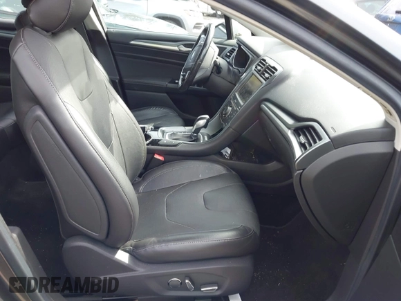 2015 Ford Fusion Energi Titanium with VIN 3FA6P0SU0FR200963, listed as a IAAI auction lot 41897182 with 104,100 mi miles. Bid and sale history available at carsss.com. Image 5.
