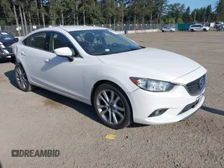 2015 Mazda 6 i Touring with VIN JM1GJ1V57F1209356, listed as a IAAI auction lot 42173320 with 129,722 mi miles and . Bid and sale history available at DreamBid. Image 1.