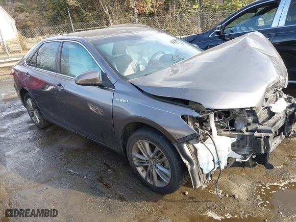 2015 Toyota Camry Hybrid LE with VIN 4T1BD1FK5FU164384, listed as a IAAI auction lot 41704922 with 122,132 mi miles. Bid and sale history available at carsss.com. Image 1.