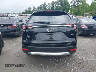 2022 Mazda CX-9 Touring Plus z VIN JM3TCBAY2N0619279, wystawiony jako IAAI lot #42373722 z przebiegiem 43 540 mil mil oraz . Historia ofert i sprzedaży dostępna na DreamBid. Obrazek 16.