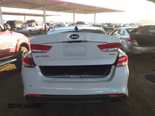 2016 Kia Optima EX with VIN 5XXGU4L30GG117411, listed as a IAAI auction lot 42034988 with 123,387 mi miles. Bid and sale history available at carsss.com. Image 6.