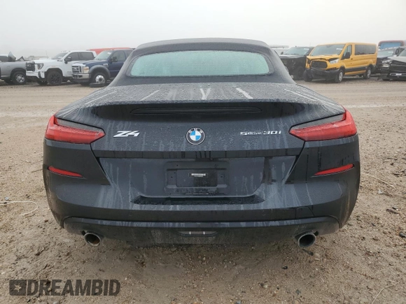 2022 BMW Z4 sDrive30i with VIN WBAHF3C04NWX42062, listed as a Copart auction lot 84463034 with 0 mi miles and Salvage Title. Bid and sale history available at carsss.com. Image 6.