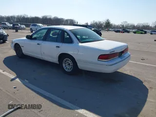 1995 Ford Crown Victoria LX с VIN 2FALP74W3SX123480, выставлен на аукционе IAAI как лот 41737431 с пробегом Не указан миль и . История ставок и продаж доступна на DreamBid. Изображение 3.