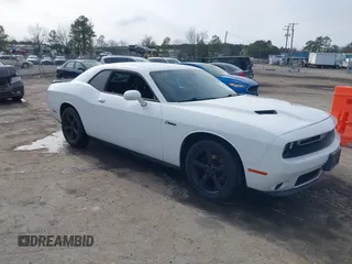 2016 Dodge Challenger SXT z VIN 2C3CDZAG6GH263508, wystawiony jako IAAI lot #41587297 z przebiegiem 119 114 mil mil oraz . Historia ofert i sprzedaży dostępna na DreamBid. Obrazek 1.