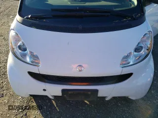 2011 Smart fortwo Pure z VIN WMEEJ3BA4BK473760, wystawiony jako Copart lot #78081344 z przebiegiem 75 966 mil mil oraz Szkoda całkowita • Salvage title. Historia ofert i sprzedaży dostępna na DreamBid. Obrazek 11.