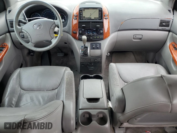 2010 Toyota Sienna XLE with VIN 5TDYK4CC1AS322395, listed as a Copart auction lot 60520215 with 148,725 mi miles and Salvage title. Bid and sale history available at DreamBid. Image 8.
