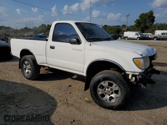 1999 Toyota Tacoma with VIN 4TAPM62N8XZ457624, listed as a Copart auction lot 71565904 with 133,851 mi miles and Salvage Title. Bid and sale history available at DreamBid. Image 4.