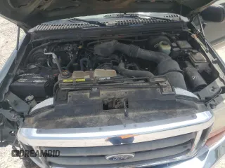 2000 Ford F-250 XL с VIN 1FTNX21L1YEB33533, выставлен на аукционе Copart как лот 58313795 с пробегом 142 753 миль миль и Списание • Salvage title. История ставок и продаж доступна на DreamBid. Изображение 11.