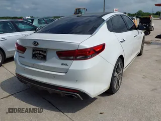 2016 Kia Optima SXL Turbo with VIN 5XXGV4L26GG015874, listed as a IAAI auction lot 42127366 with 166,970 mi miles. Bid and sale history available at carsss.com. Image 4.