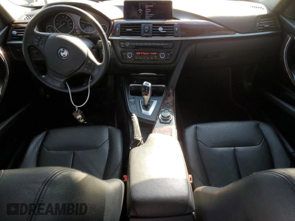 2013 BMW 3 Series 328i xDrive with VIN WBA3B3C56DF530814, listed as a Copart auction lot 52820915 with 144,164 mi miles and Salvage Title. Bid and sale history available at carsss.com. Image 8.