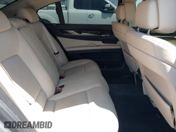 2012 BMW 7 Series 740Li with VIN WBAKB4C50CC576429, listed as a IAAI auction lot 42153378 with 161,168 mi miles and . Bid and sale history available at DreamBid. Image 8.