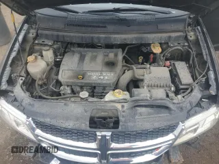 2015 Dodge Journey American Value with VIN 3C4PDCAB3FT520452, listed as a Copart auction lot 52591255 with 299,871 mi miles and Clean Title. Bid and sale history available at DreamBid. Image 12.