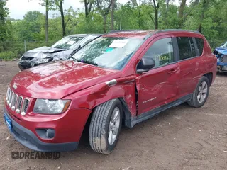 2014 Jeep Compass Sport with VIN 1C4NJDBB8ED799048, listed as a IAAI auction lot 39434584 with 119,507 mi miles. Bid and sale history available at carsss.com. Image 6.