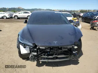 2025 Tesla Model 3 Long Range with VIN 5YJ3E1EA9SF910112, listed as a Copart auction lot 57993525 with 4,645 mi miles and Salvage title. Bid and sale history available at DreamBid. Image 5.