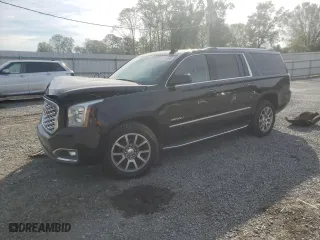 2020 GMC Yukon XL Denali with VIN 1GKS1HKJ0LR182572, listed as a Copart auction lot 80741994 with 107,195 mi miles and Salvage Title. Bid and sale history available at carsss.com. Image 1.