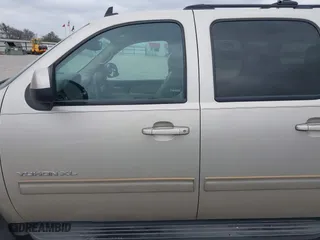 2013 GMC Yukon XL SLT with VIN 1GKS1KE02DR330318, listed as a IAAI auction lot 41526110 with 187,699 mi miles. Bid and sale history available at carsss.com. Image 14.
