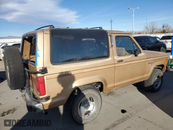 1988 Ford Bronco with VIN 1FMCU14T9JUB53901, listed as a Copart auction lot 84953454 with 222,374 mi miles and Clean title. Bid and sale history available at DreamBid. Image 3.