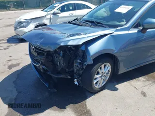 2015 Mazda 3 i Touring with VIN 3MZBM1L79FM187074, listed as a IAAI auction lot 42147375 with 23,394 mi miles and . Bid and sale history available at DreamBid. Image 6.