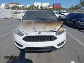 2017 Ford Focus SE with VIN 1FADP3F25HL221763, listed as a IAAI auction lot 41995746 with 101,369 mi miles and . Bid and sale history available at DreamBid. Image 12.