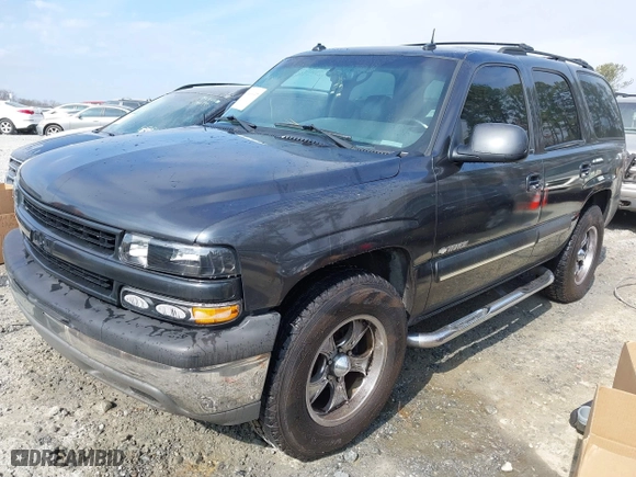 2003 Chevrolet Tahoe LS with VIN 1GNEC13ZX3R209167, listed as a IAAI auction lot 41496637 with 325,006 mi miles. Bid and sale history available at carsss.com. Image 2.