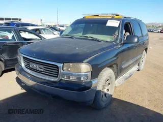 2005 GMC Yukon SLT with VIN 1GKEC13T25R206811, listed as a IAAI auction lot 41849830 with 231,863 mi miles. Bid and sale history available at carsss.com. Image 2.