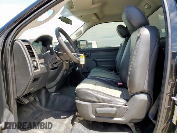 2012 Ram 1500 Express with VIN 3C6JD6AT7CG183408, listed as a Copart auction lot 57630175 with 124,003 mi miles and Salvage title. Bid and sale history available at DreamBid. Image 7.