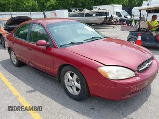 2003 Ford Taurus SE Standard z VIN 1FAFP53UX3A132852, wystawiony jako IAAI lot #42477125 z przebiegiem 210 844 mil mil oraz . Historia ofert i sprzedaży dostępna na DreamBid. Obrazek 1.