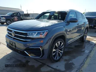 2023 Volkswagen Atlas SEL Premium R-Line z VIN 1V2FE2CA0PC224677, wystawiony jako IAAI lot #41991931 z przebiegiem 22 620 mil mil oraz . Historia ofert i sprzedaży dostępna na DreamBid. Obrazek 2.