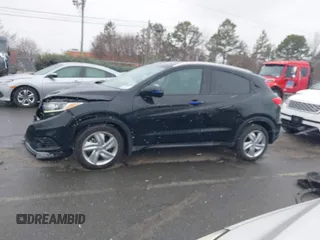 2019 Honda HR-V EX with VIN 3CZRU5H52KM704011, listed as a IAAI auction lot 41616517 with 57,921 mi miles. Bid and sale history available at carsss.com. Image 14.