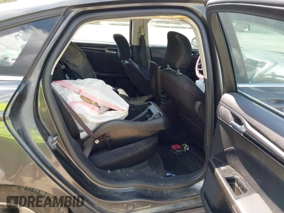 2015 Ford Fusion SE with VIN 1FA6P0H78F5115339, listed as a IAAI auction lot 42626943 with 242,359 mi miles and . Bid and sale history available at DreamBid. Image 8.