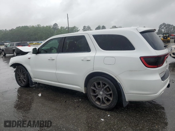 2017 Dodge Durango R/T with VIN 1C4SDHCT1HC609691, listed as a Copart auction lot 59433395 with 124,502 mi miles and Salvage title. Bid and sale history available at DreamBid. Image 2.