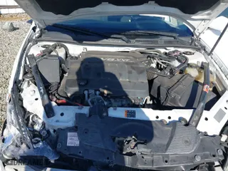 2013 Chevrolet Impala Police with VIN 2G1WD5E34D1265263, listed as a IAAI auction lot 41115415 with 191,679 mi miles. Bid and sale history available at carsss.com. Image 10.