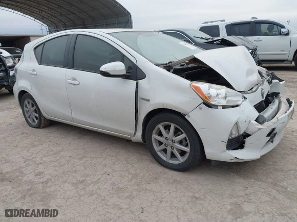 2014 Toyota Prius c One with VIN JTDKDTB31E1559712, listed as a IAAI auction lot 41286514 with 173,321 mi miles. Bid and sale history available at carsss.com. Image 1.