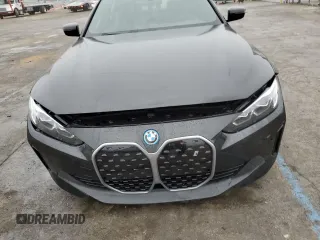 2022 BMW i4 eDrive40 z VIN WBY73AW06NFN08995, wystawiony jako Copart lot #87086344 z przebiegiem 14 059 mil mil oraz Szkody całkowita. Historia ofert i sprzedaży dostępna na DreamBid. Obrazek 5.