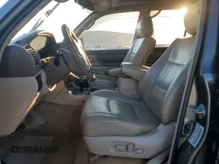 1999 Toyota Land Cruiser with VIN JT3HT05J9X0074477, listed as a Copart auction lot 88665165 with 196,783 mi miles and Salvage Title. Bid and sale history available at carsss.com. Image 7.
