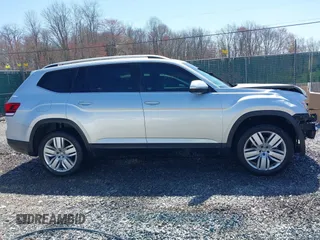 2019 Volkswagen Atlas SE with VIN 1V2UR2CA7KC528108, listed as a IAAI auction lot 42045402 with 66,479 mi miles and . Bid and sale history available at DreamBid. Image 14.
