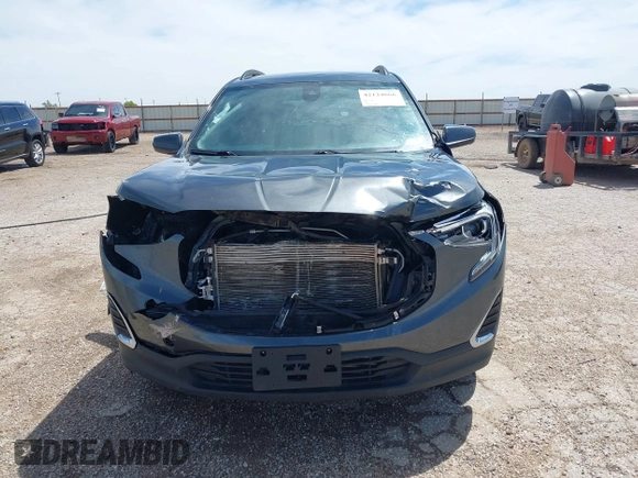2021 GMC Terrain SLE z VIN 3GKALMEV2ML384884, wystawiony jako IAAI lot #42124666 z przebiegiem 86 791 mil mil oraz . Historia ofert i sprzedaży dostępna na DreamBid. Obrazek 13.