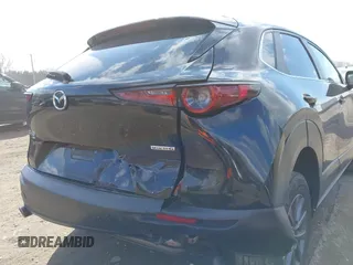 2022 Mazda CX-30 S with VIN 3MVDMBALXNM402265, listed as a IAAI auction lot 41458605 with 76,291 mi miles and . Bid and sale history available at carsss.com. Image 17.