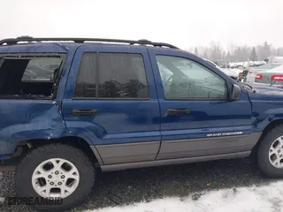 2001 Jeep Grand Cherokee Laredo with VIN 1J4GW48N21C730703, listed as a IAAI auction lot 41581667 with 111,054 mi miles. Bid and sale history available at carsss.com. Image 14.