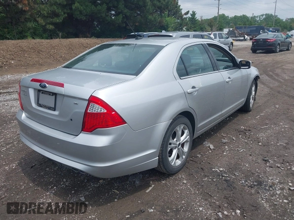 2012 Ford Fusion SE z VIN 3FAHP0HA3CR421636, wystawiony jako IAAI lot #42454385 z przebiegiem 138 282 mil mil oraz . Historia ofert i sprzedaży dostępna na DreamBid. Obrazek 4.