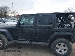 2008 Jeep Wrangler Unlimited X with VIN 1J8GA39148L577903, listed as a IAAI auction lot 41564957 with 95,359 mi miles. Bid and sale history available at carsss.com. Image 14.