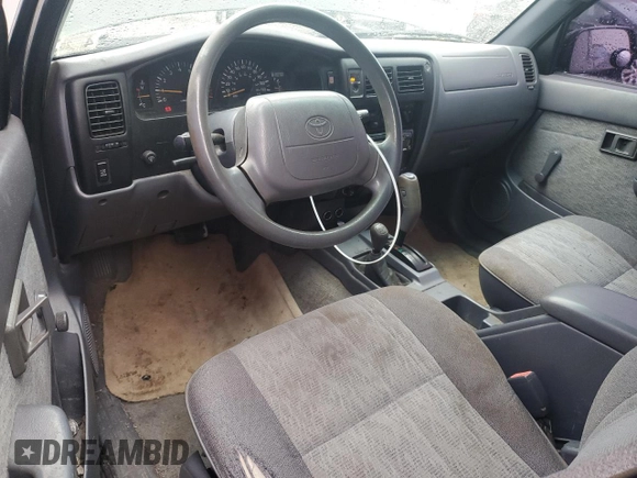 1999 Toyota Tacoma with VIN 4TAPM62N3XZ485783, listed as a Copart auction lot 52459485 with 294,237 mi miles and Clean Title. Bid and sale history available at DreamBid. Image 8.