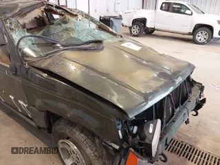 1997 Jeep Grand Cherokee Laredo z VIN 1J4GZ58YXVC729117, wystawiony jako IAAI lot #42244799 z przebiegiem Nie podano mil oraz . Historia ofert i sprzedaży dostępna na DreamBid. Obrazek 20.