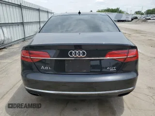 2015 Audi A8 4.0T z VIN WAU32AFD8FN001493, wystawiony jako Copart lot #57394315 z przebiegiem 120 464 mil mil oraz Szkoda całkowita • Salvage title. Historia ofert i sprzedaży dostępna na DreamBid. Obrazek 6.