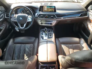 2016 BMW 7 Series 750i xDrive с VIN WBA7F2C56GG417976, выставлен на аукционе Copart как лот 55976095 с пробегом 113 753 миль миль и Списание • Salvage title. История ставок и продаж доступна на DreamBid. Изображение 8.