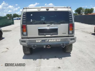 2003 Hummer H2 z VIN 5GRGN23U33H142552, wystawiony jako Copart lot #61152055 z przebiegiem Nie podano mil oraz Czysty tytuł • Clean title. Historia ofert i sprzedaży dostępna na DreamBid. Obrazek 6.