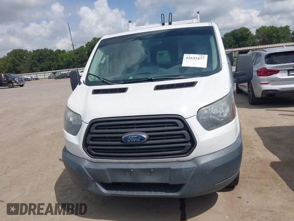 2015 Ford Transit Cargo with VIN 1FTYR2ZM2FKA86869, listed as a IAAI auction lot 42635477 with 14,695 mi miles and . Bid and sale history available at DreamBid. Image 12.