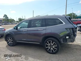 2022 Honda Pilot Elite with VIN 5FNYF6H04NB025212, listed as a IAAI auction lot 42430032 with 69,427 mi miles and . Bid and sale history available at DreamBid. Image 14.