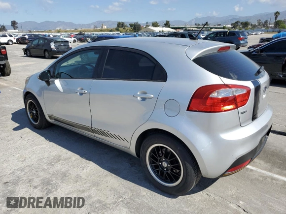 2012 Kia Rio LX with VIN KNADM5A37C6092993, listed as a Copart auction lot 48458034 with 108,314 mi miles and Salvage Title. Bid and sale history available at DreamBid. Image 2.