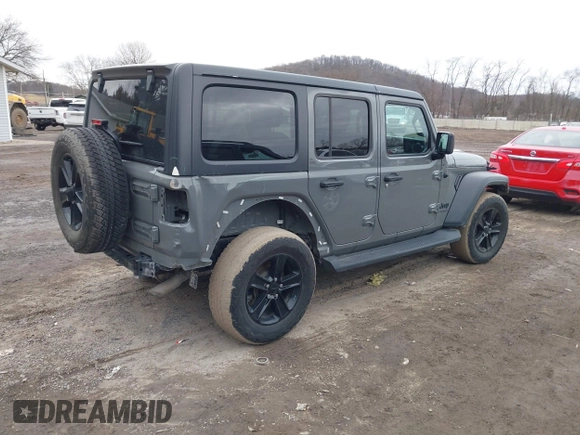 2021 Jeep Wrangler Unlimited Sport Altitude with VIN 1C4HJXDG1MW603784, listed as a IAAI auction lot 41509231 with 102,567 mi miles and . Bid and sale history available at DreamBid. Image 4.